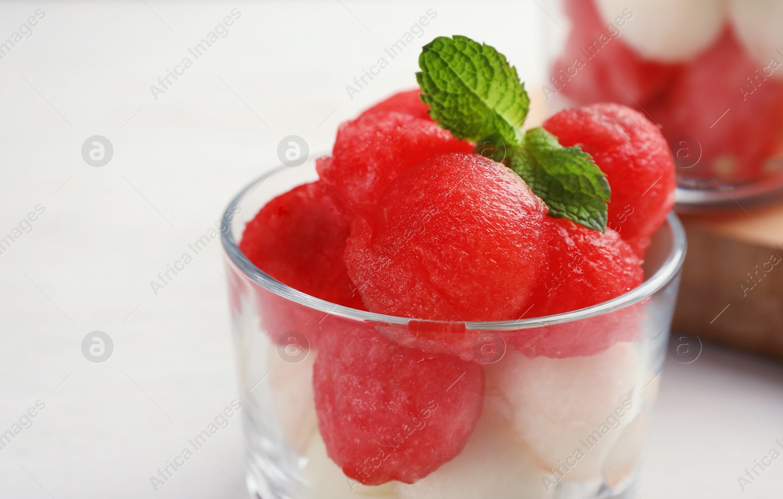 Photo of Bowl with melon and watermelon balls, closeup