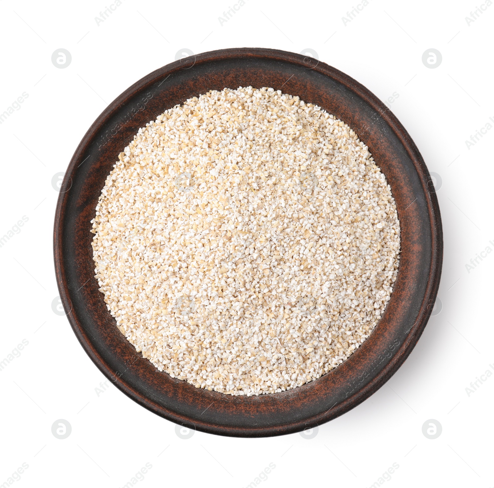 Photo of Raw barley groats in bowl isolated on white, top view