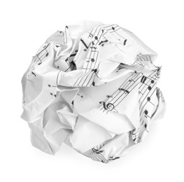 Photo of Crumpled sheet of paper with musical notes isolated on white