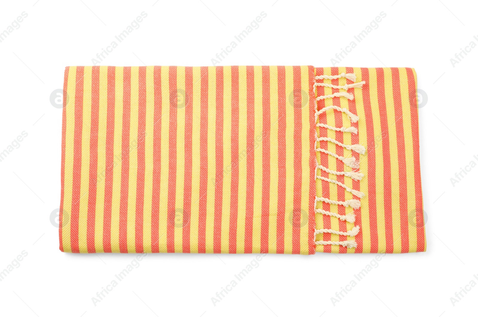 Photo of Folded striped beach towel isolated on white, top view