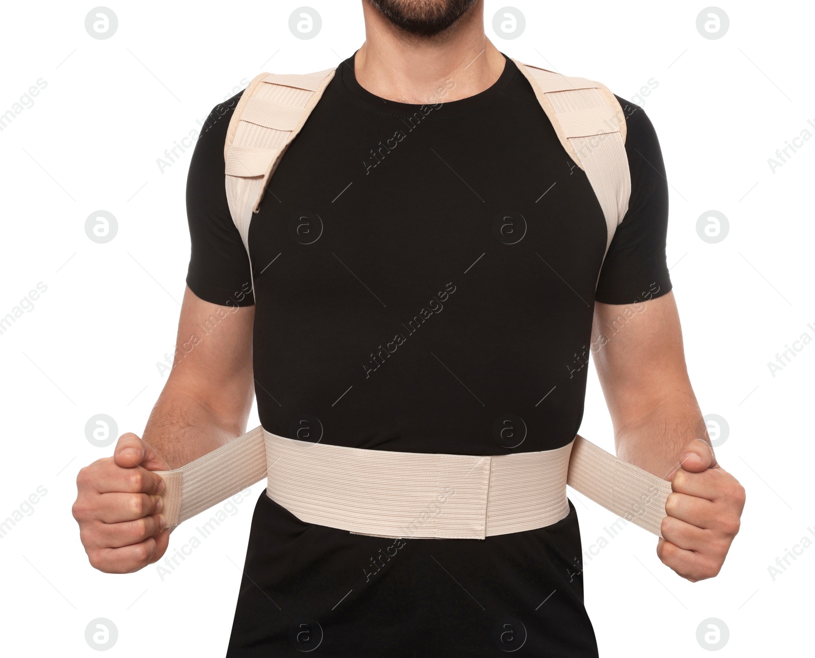 Photo of Closeup view of man with orthopedic corset on white background