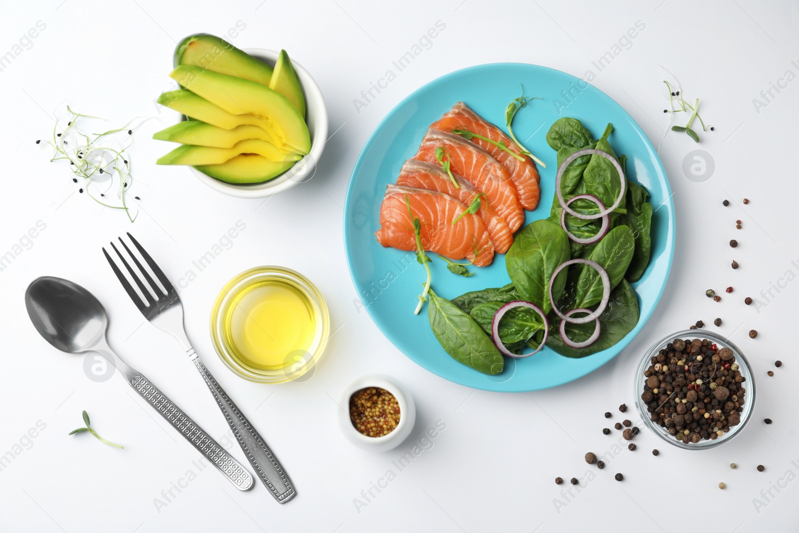 Photo of Delicious salmon with spinach and onion on white background, flat lay