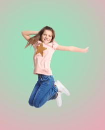 Image of Happy cute girl jumping on color gradient background