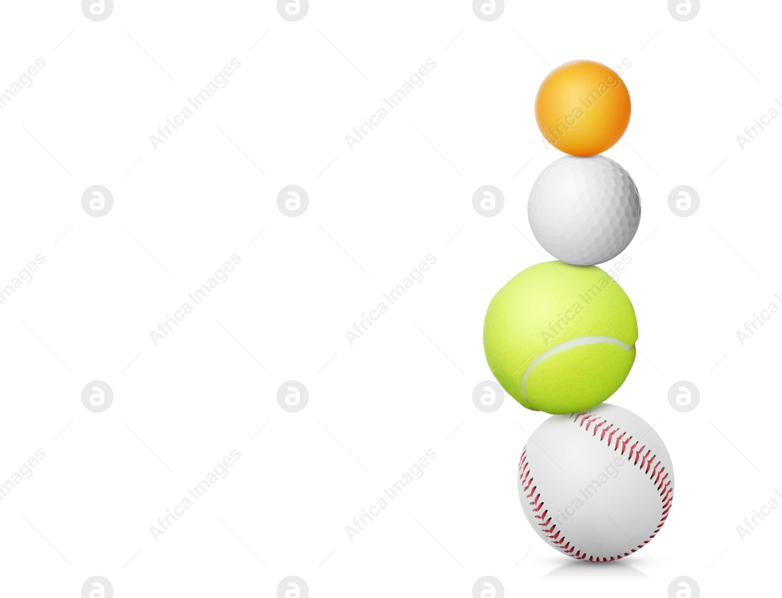 Image of Stack of different sport balls on white background