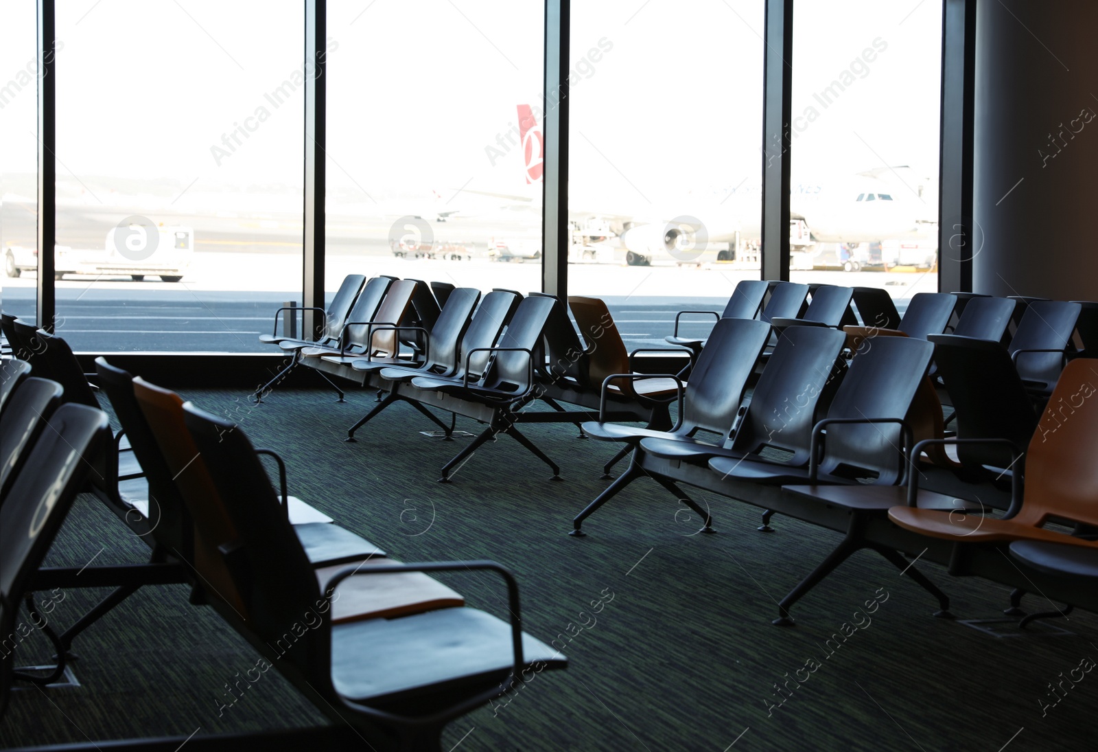 Photo of ISTANBUL, TURKEY - AUGUST 13, 2019: Waiting area with seats in new airport terminal