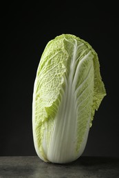 Photo of Fresh ripe Chinese cabbage on grey table