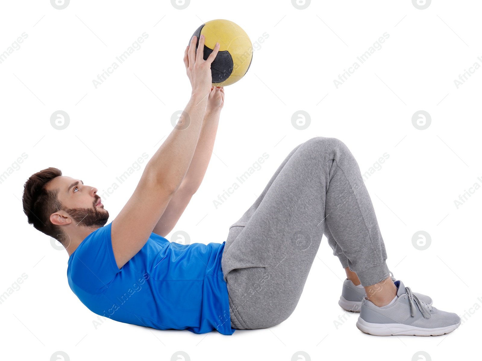 Photo of Athletic man doing exercise with medicine ball isolated on white