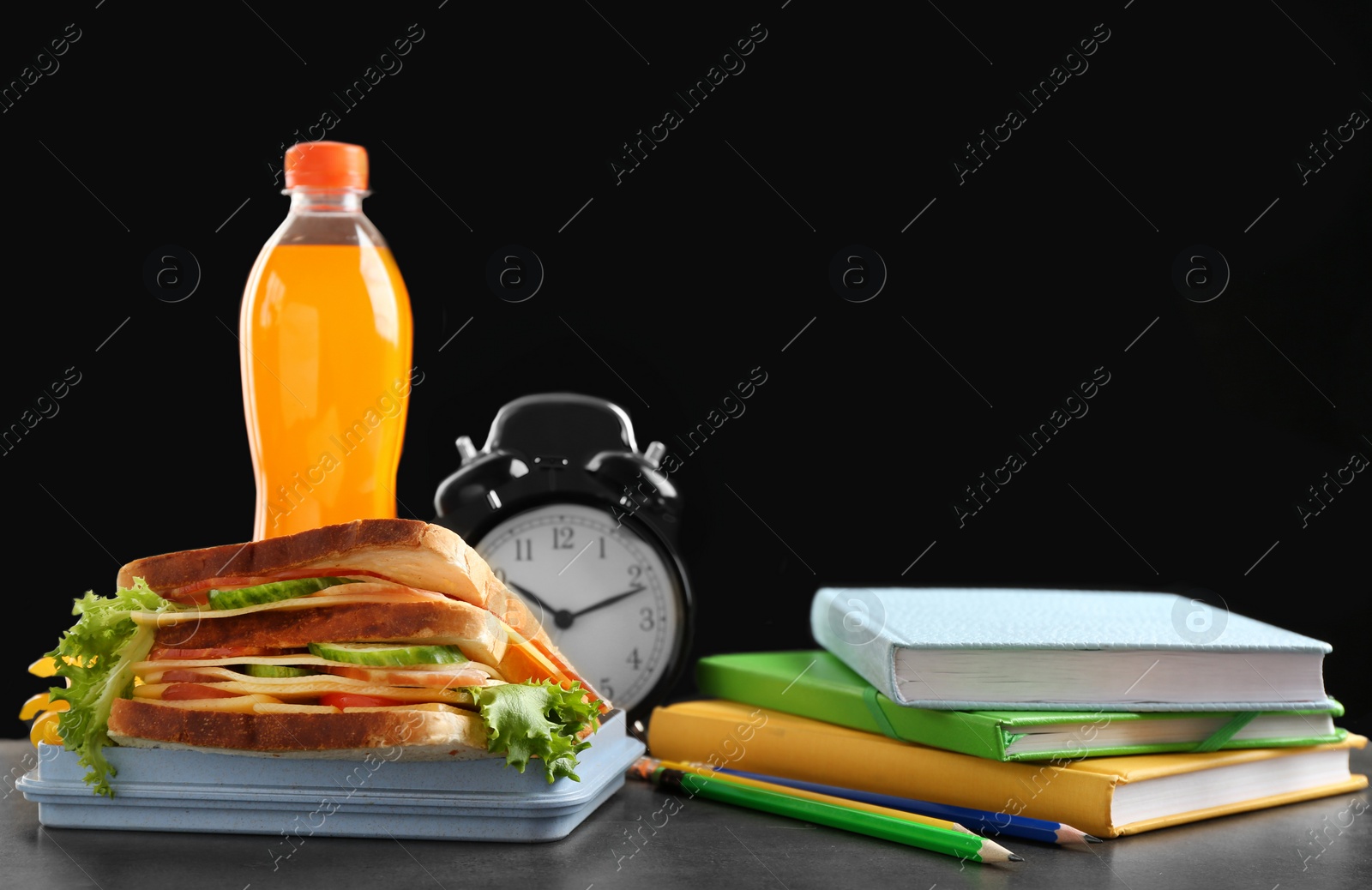 Photo of Composition with lunch box and food on table