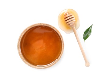 Photo of Tasty honey in bowl, dipper and green leaf on white background, flat lay. Space for text