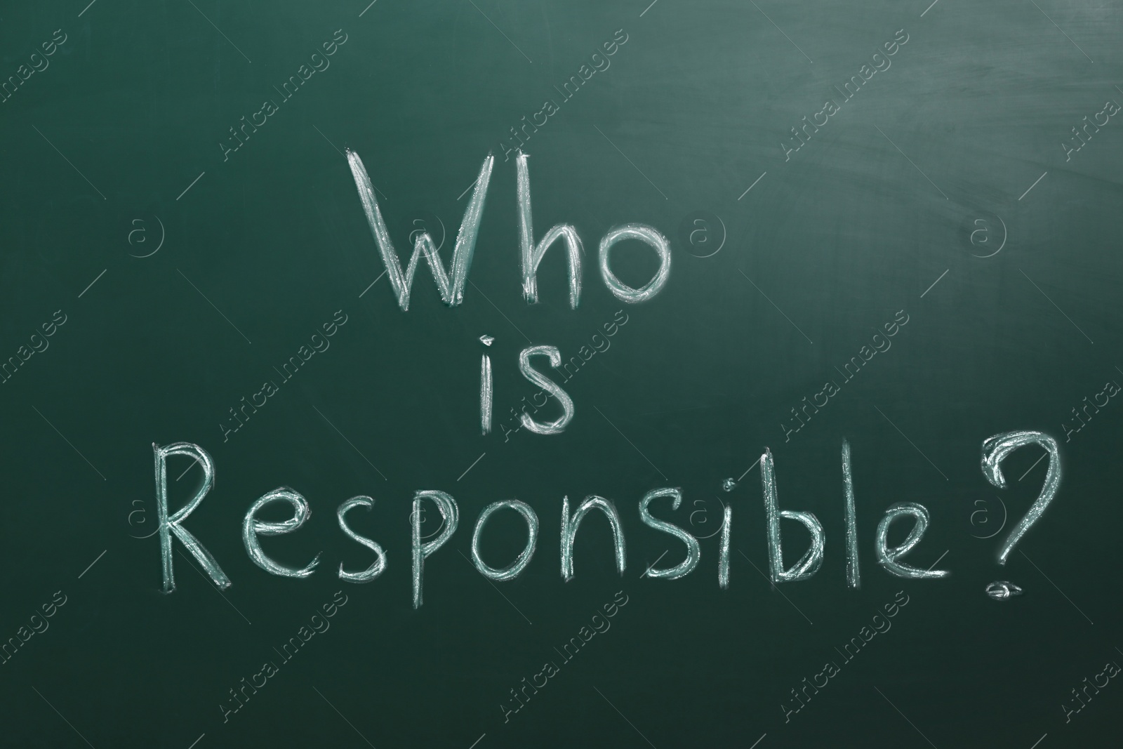 Photo of Phrase Who Is Responsible written on green chalkboard