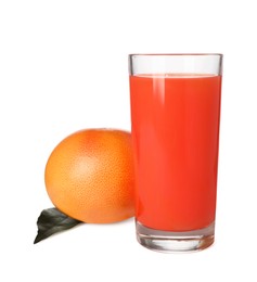 Photo of Tasty grapefruit juice in glass, fresh fruit and green leaf isolated on white