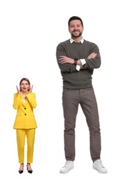 Happy big man and surprised small woman on white background