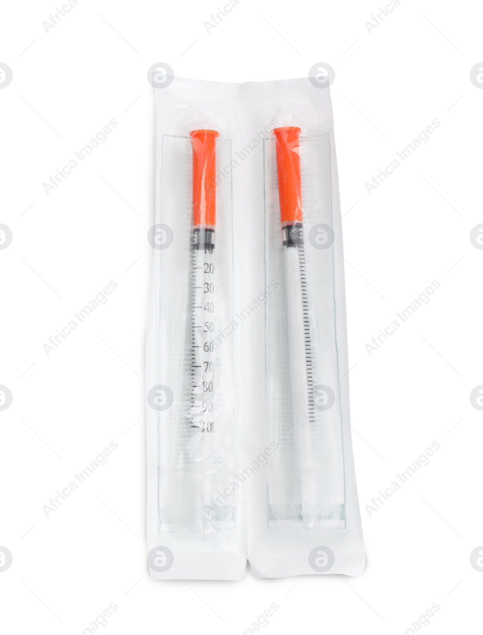 Photo of Packed disposable syringes on white background, top view