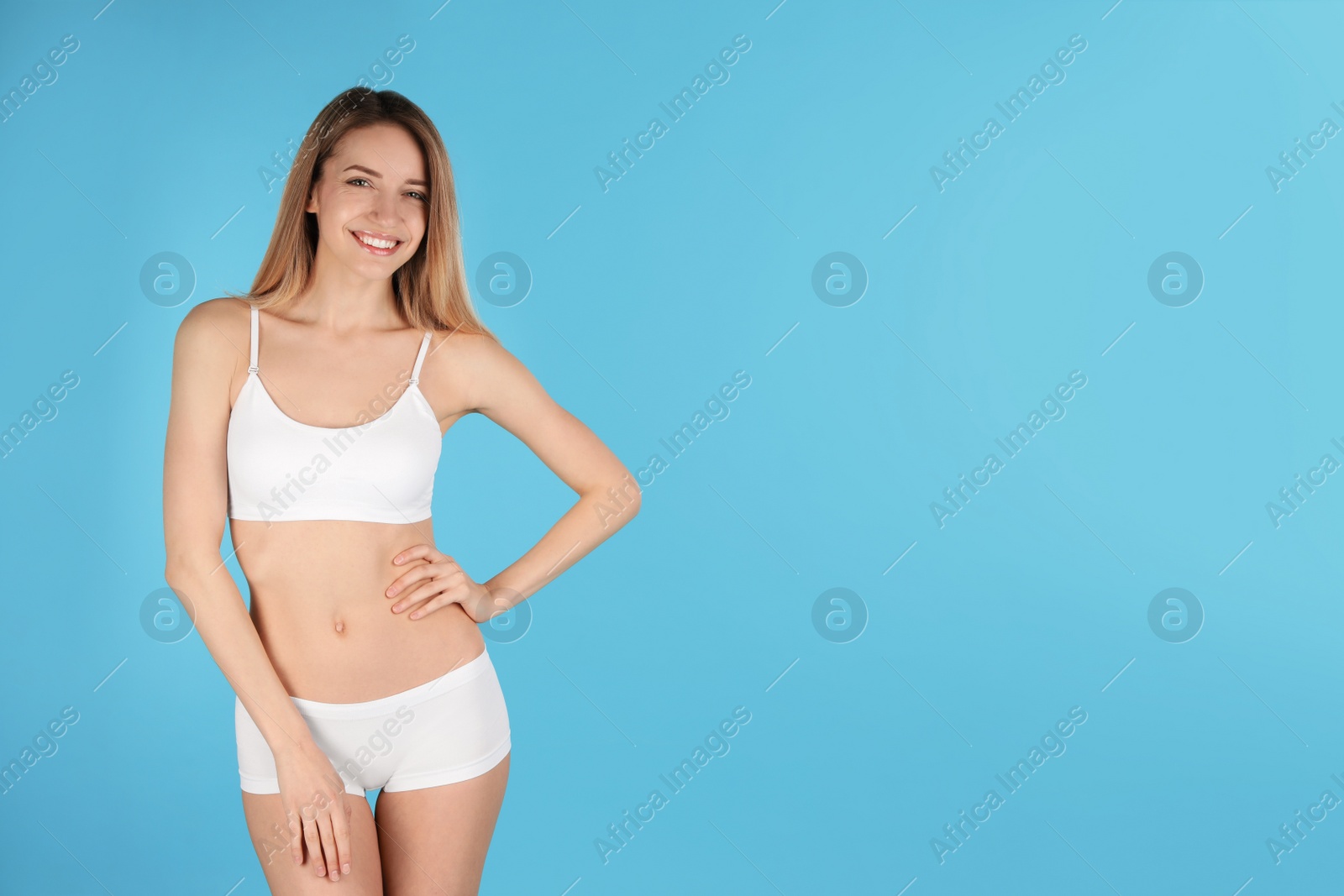 Photo of Young slim woman on color background, space for text. Perfect body