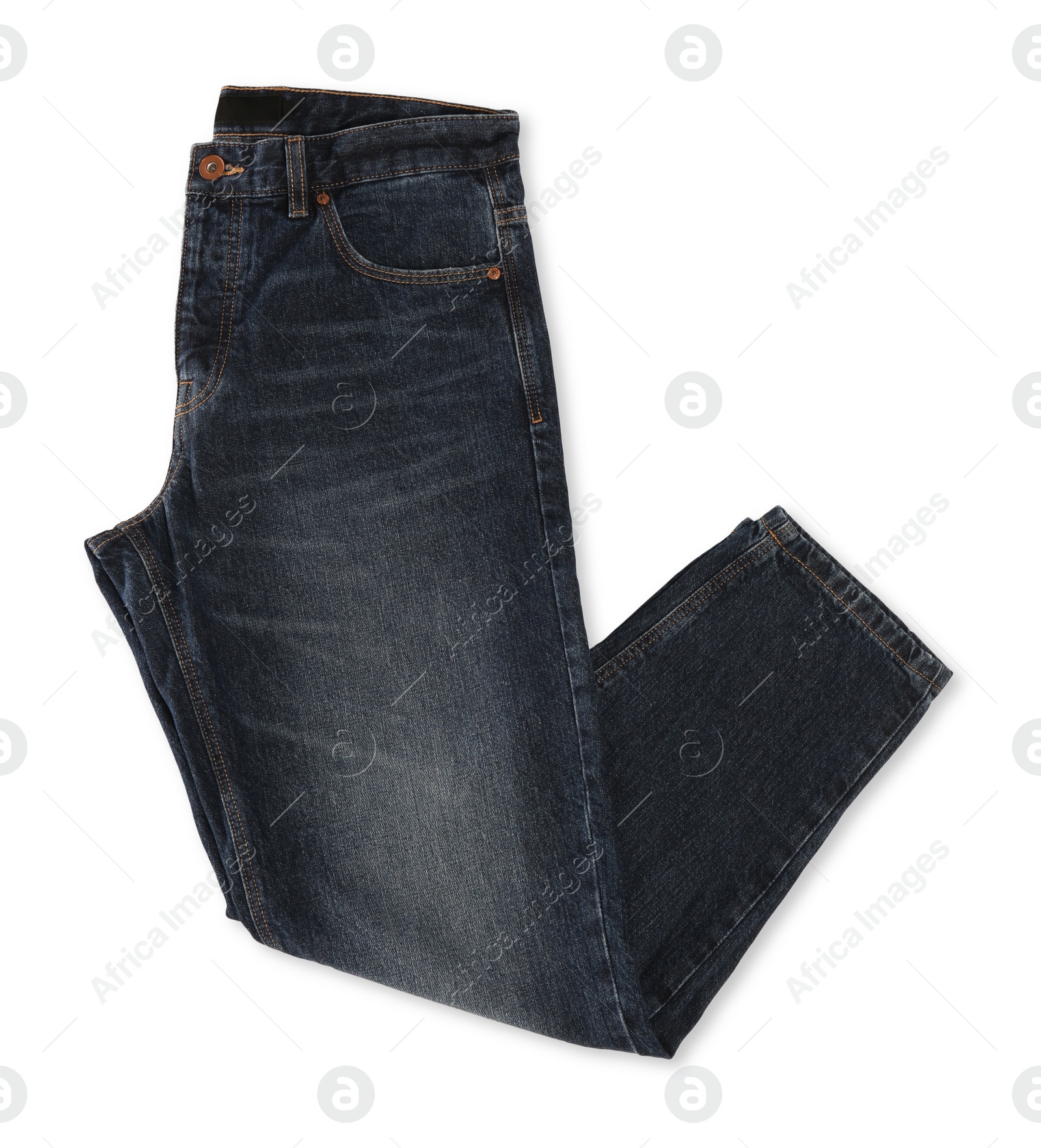 Photo of Folded dark blue jeans isolated on white, top view