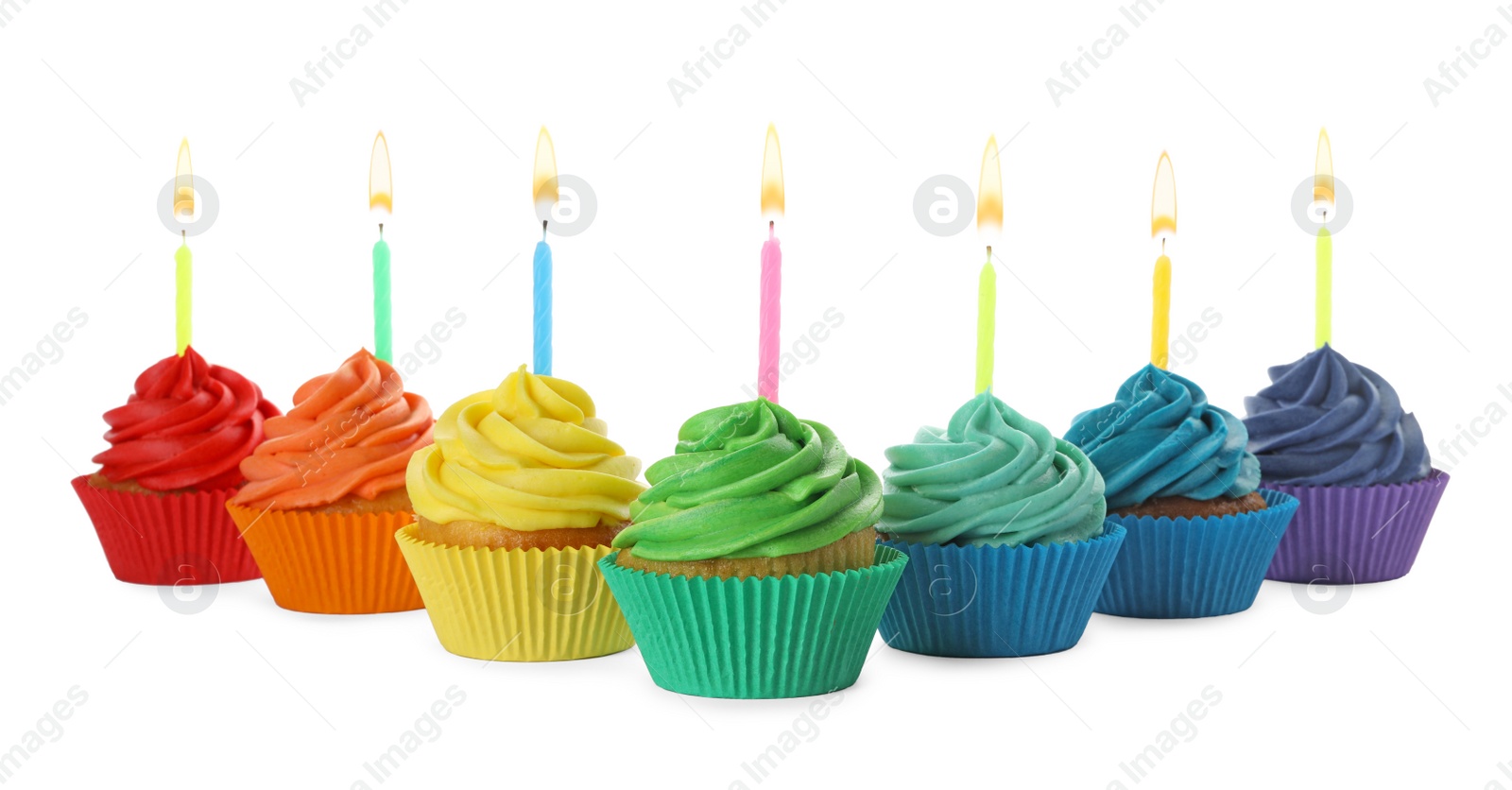 Photo of Delicious birthday cupcakes with candles isolated on white