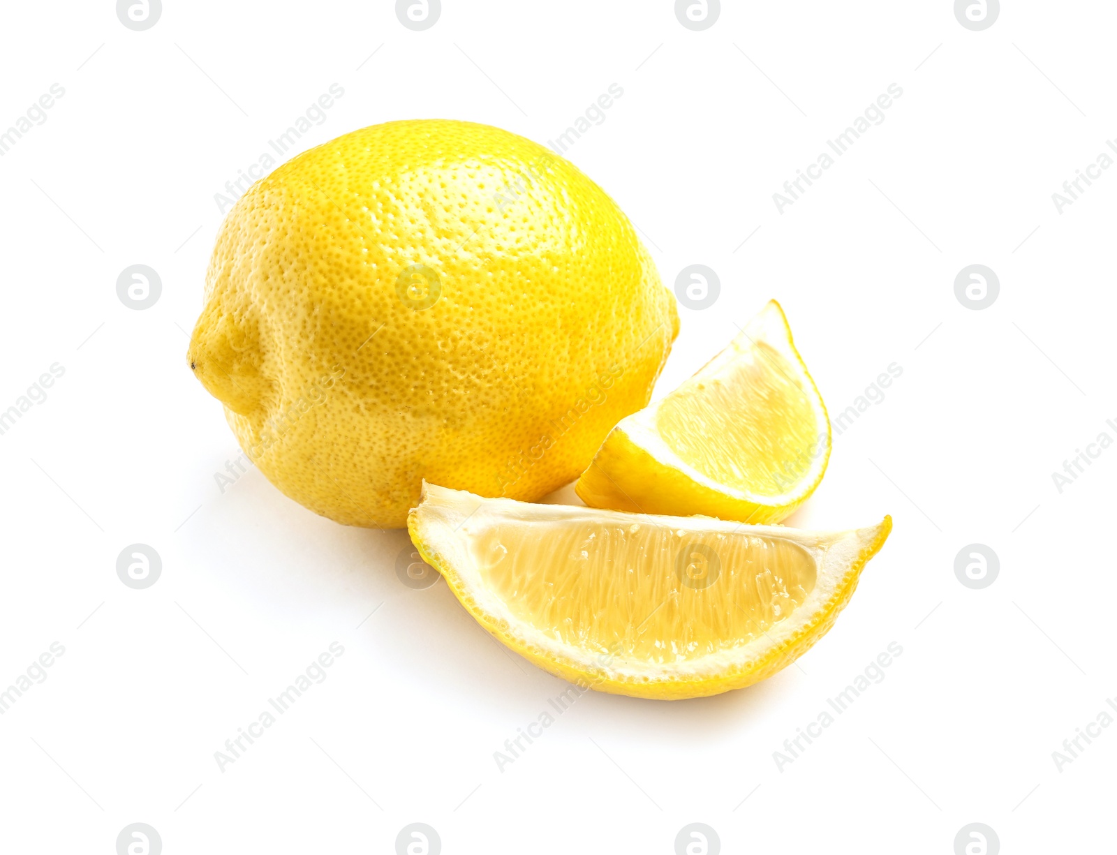 Photo of Ripe whole and sliced lemons on white background