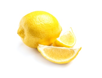 Ripe whole and sliced lemons on white background