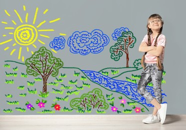 Image of Portrait of cute child girl near colorful dyed gray wall