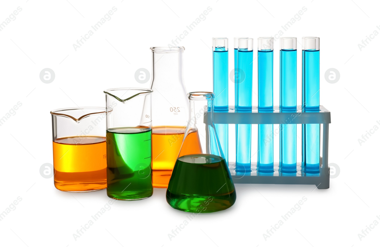 Photo of Laboratory glassware with colorful liquids on white background