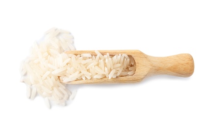 Photo of Scoop with uncooked long grain rice on white background, top view