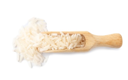 Scoop with uncooked long grain rice on white background, top view