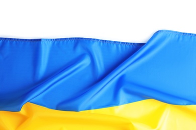 Photo of National flag of Ukraine on white background, top view