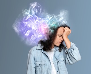 Image of Thoughtful woman with mist in head symbolizing amnesia on grey background