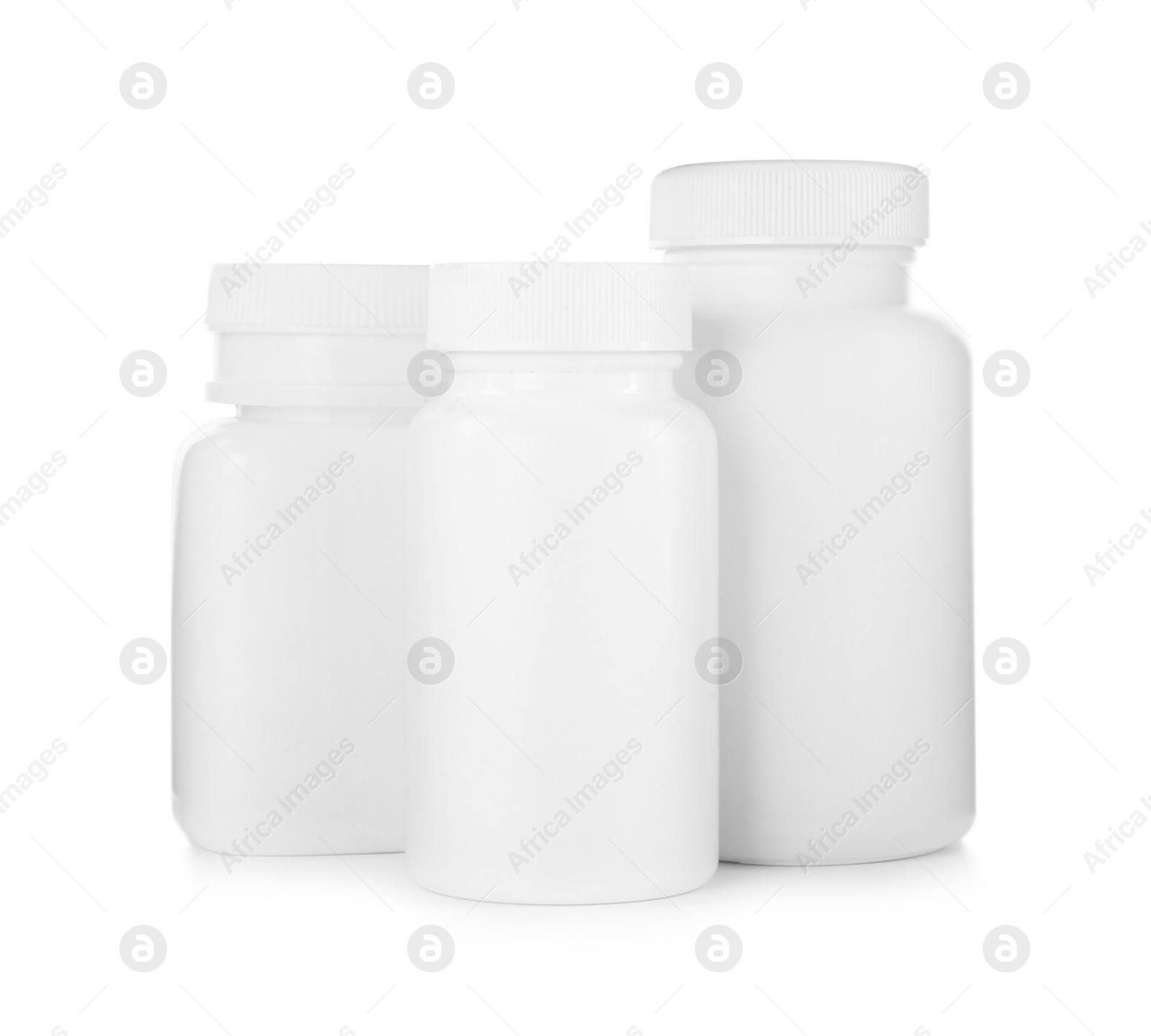 Photo of Blank plastic bottles for pills isolated on white