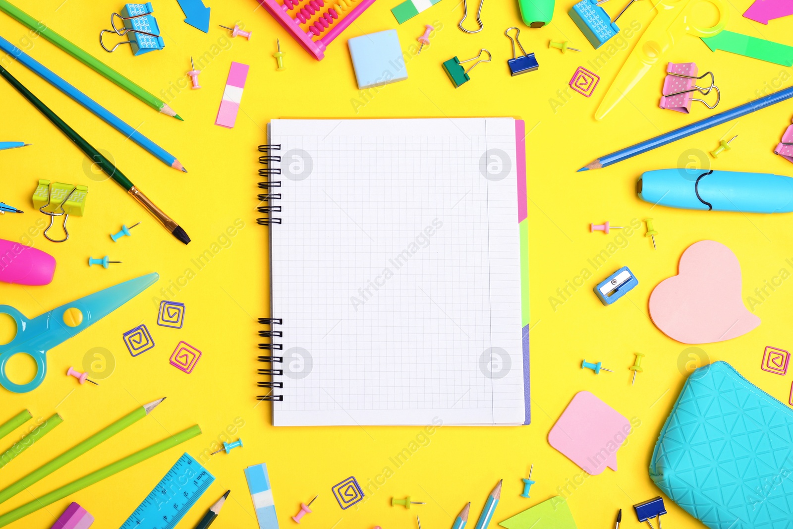 Photo of Flat lay composition with different school stationery on color background