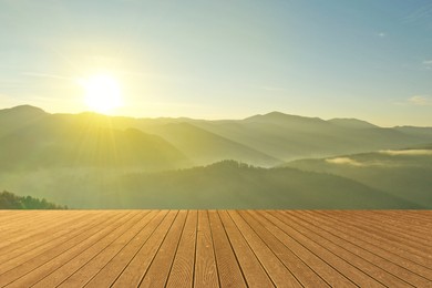 Empty wooden surface and beautiful view of mountain landscape