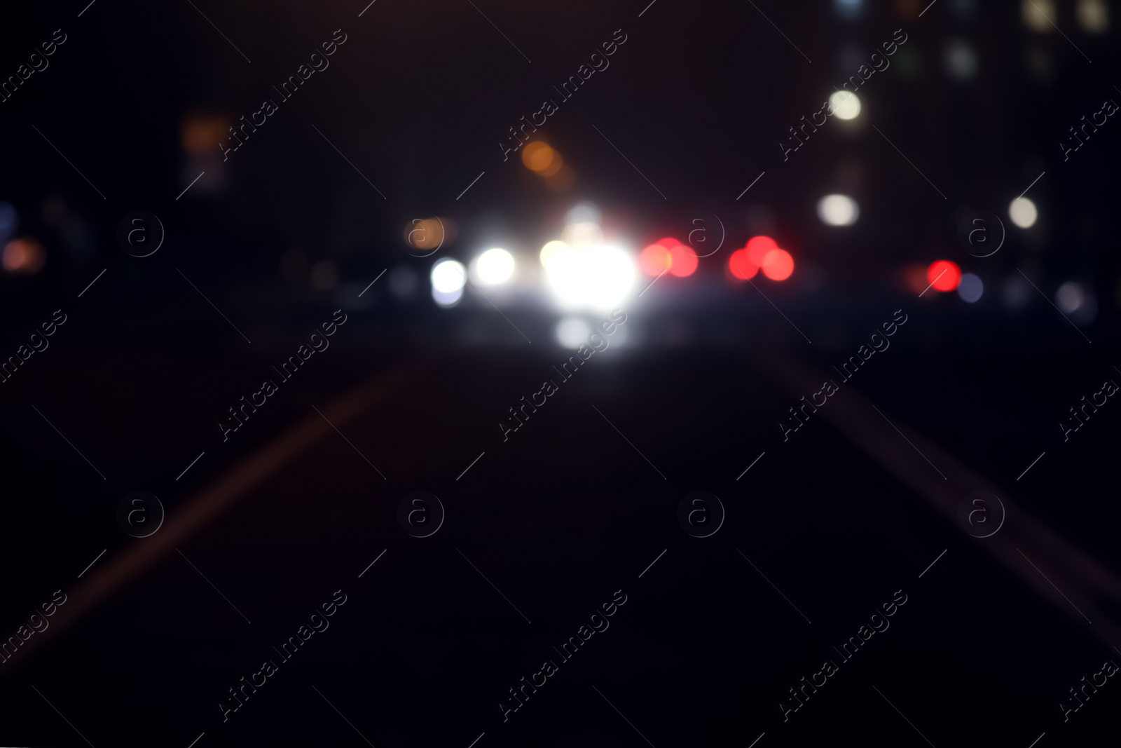 Photo of Blurred view of night city. Bokeh effect