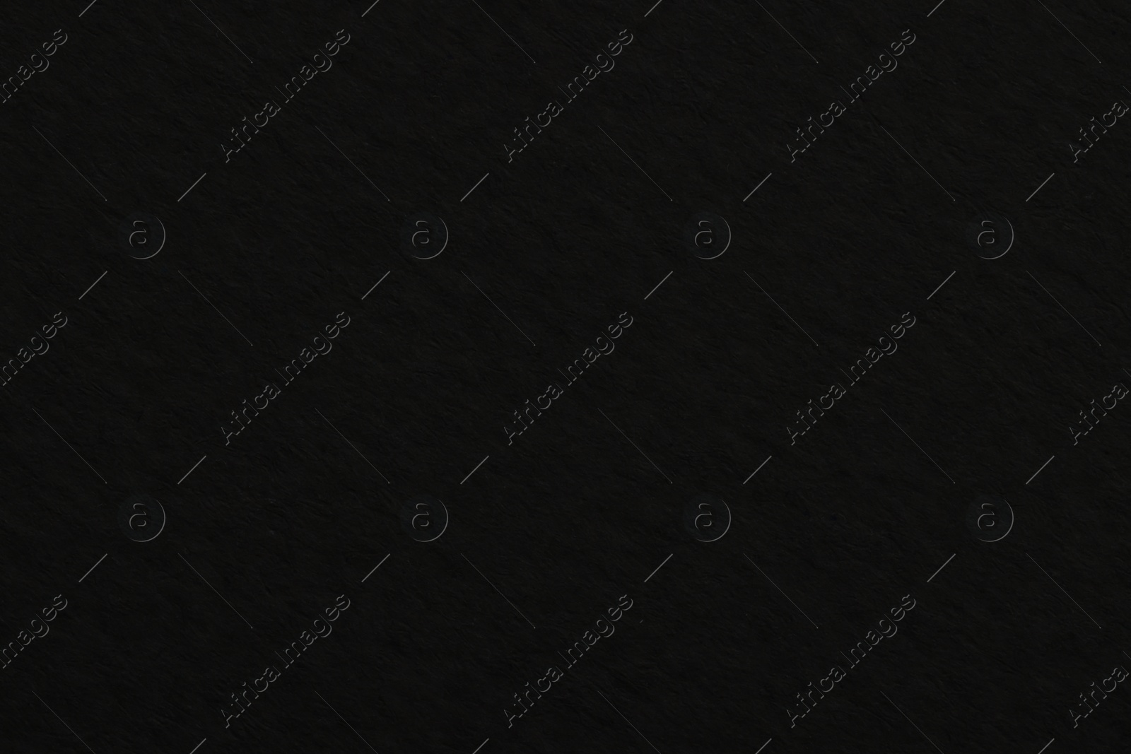 Photo of Texture of black paper sheet as background, top view