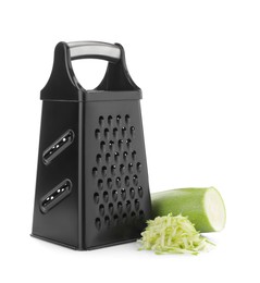 Photo of Stainless steel grater and fresh squash on white background