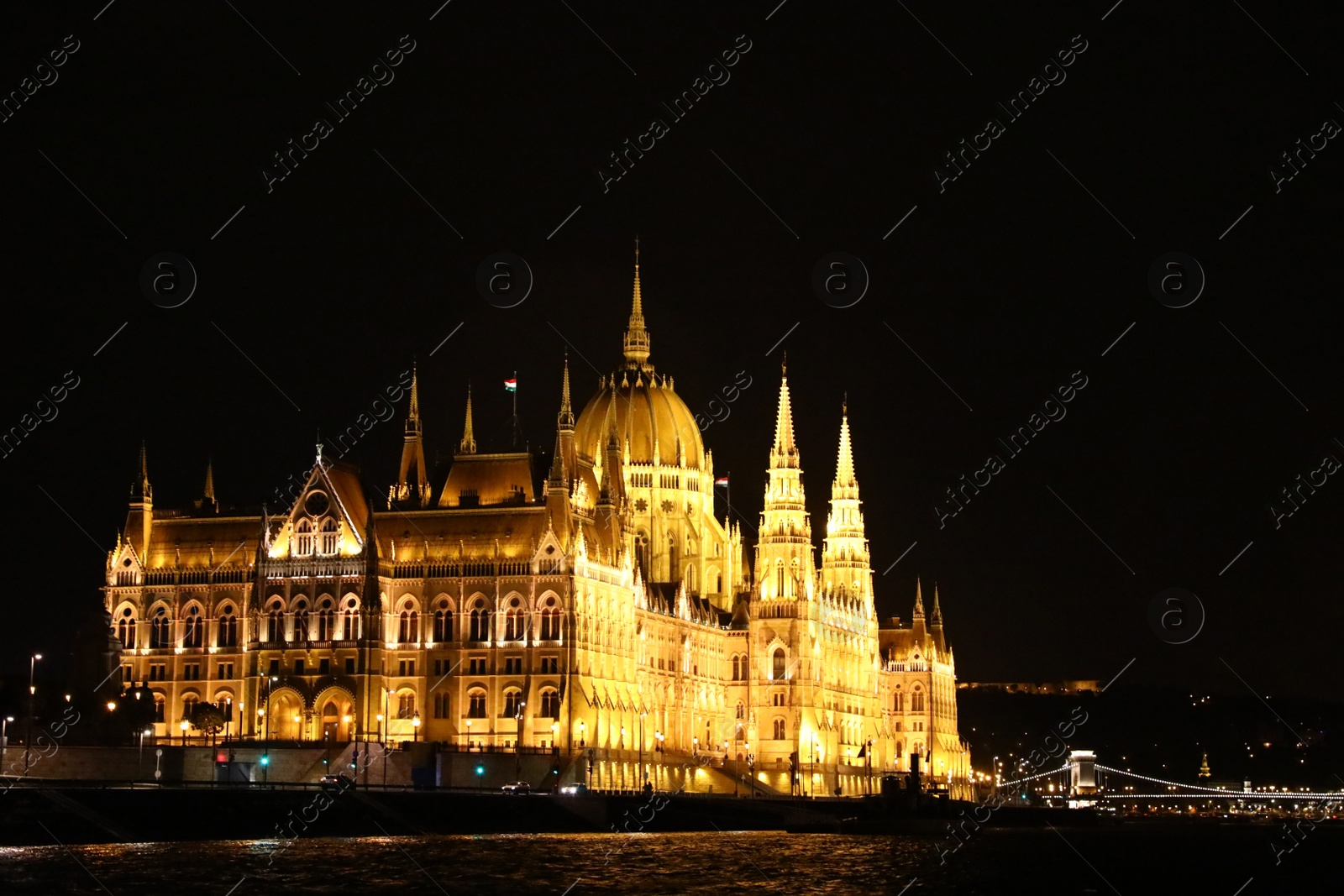 Photo of BUDAPEST, HUNGARY - APRIL 27, 2019: Beautiful night cityscape with illuminated Parliament Building