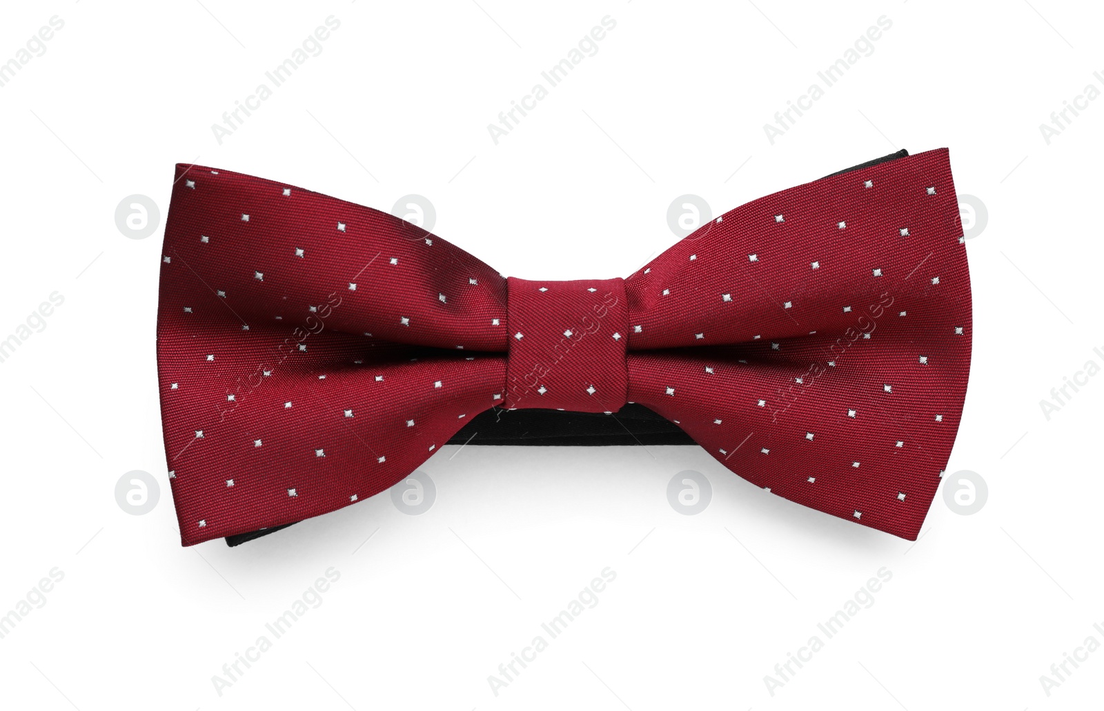 Photo of Stylish burgundy bow tie with polka dot pattern on white background, top view