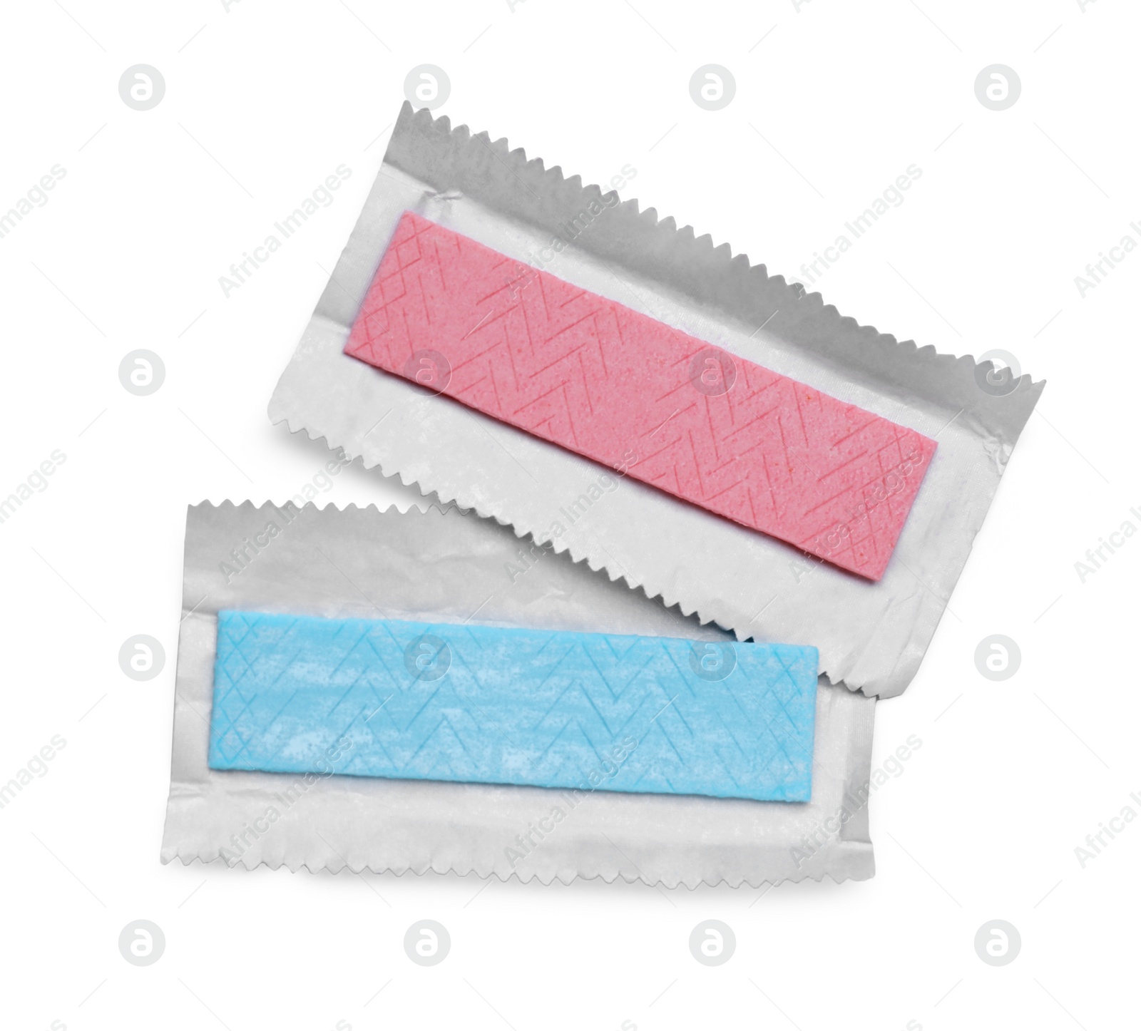 Photo of Unwrapped sticks of chewing gum isolated on white, top view