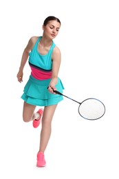 Young woman playing badminton with racket on white background