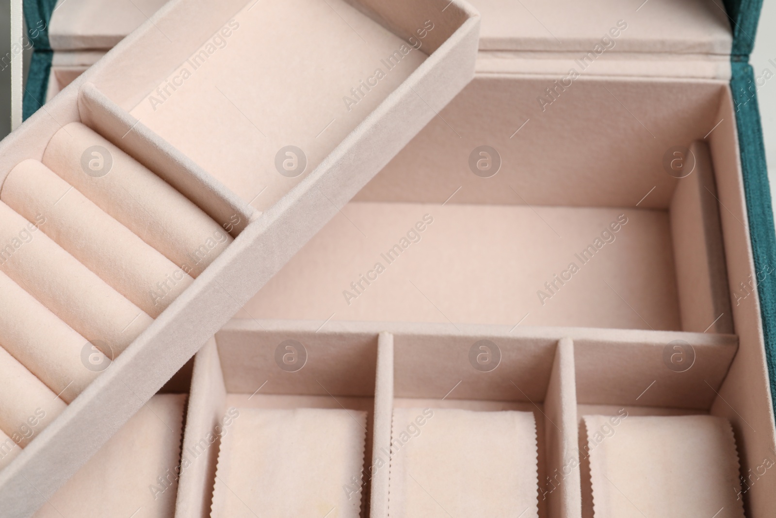 Photo of Stylish empty jewelry box as background, closeup