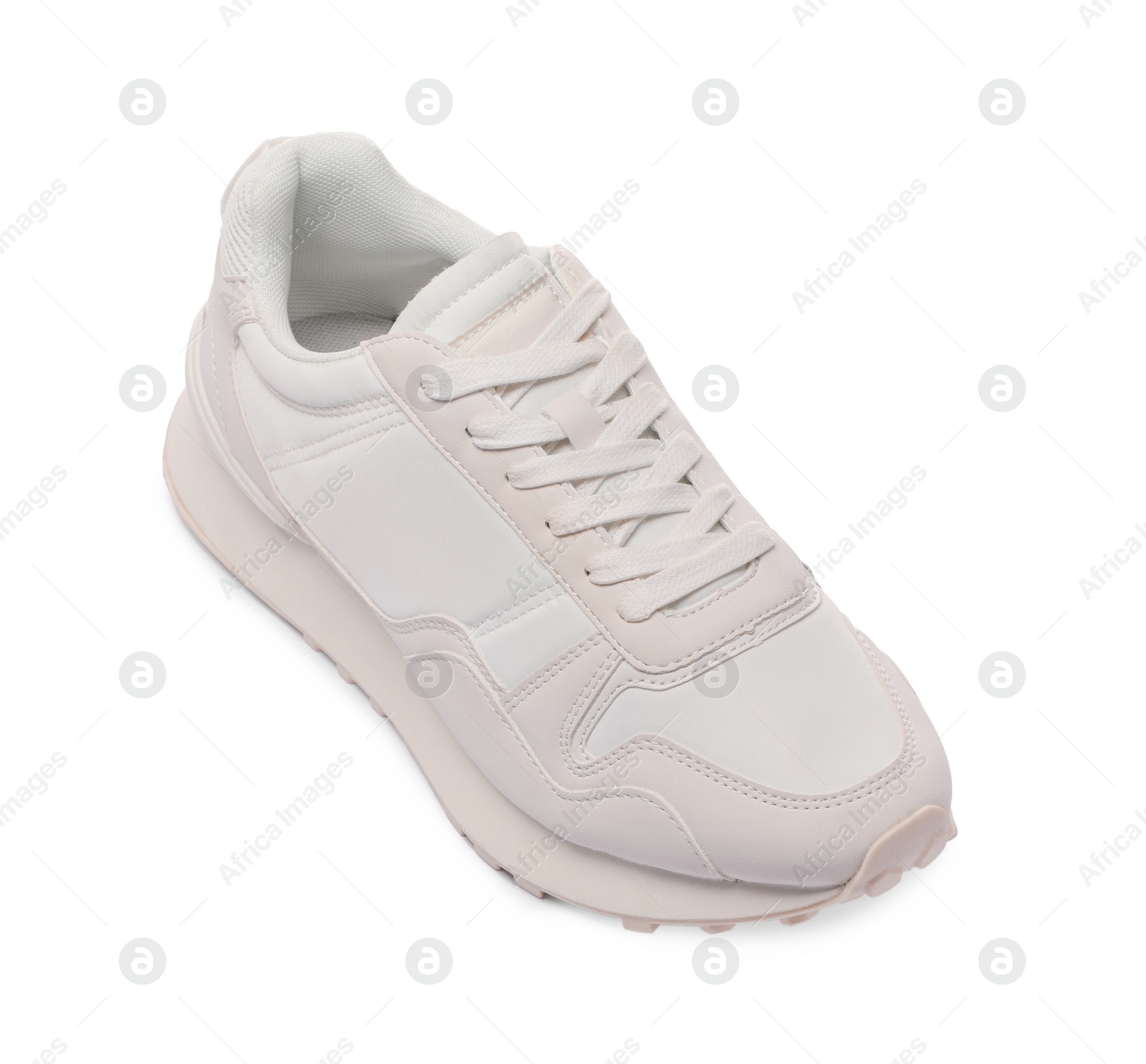 Photo of One stylish new sneaker isolated on white