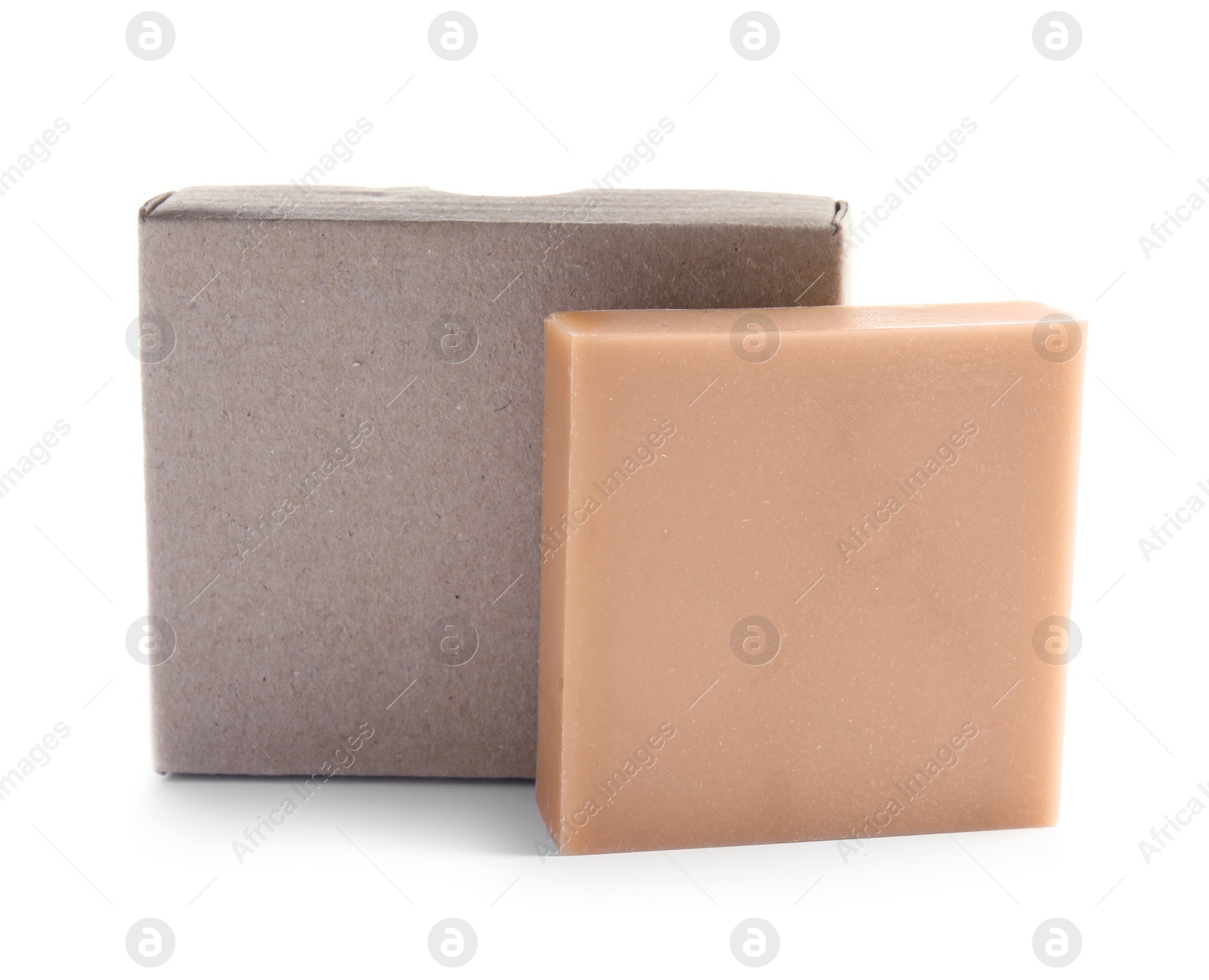 Photo of Hand made soap bar and cardboard package on white background