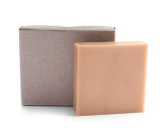 Hand made soap bar and cardboard package on white background