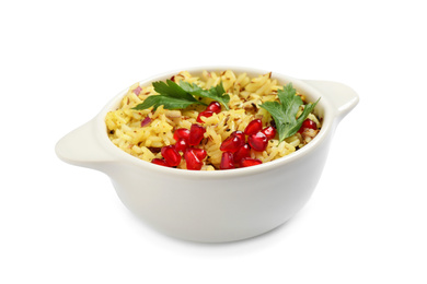 Photo of Tasty rice pilaf with pomegranate grains and parsley isolated on white