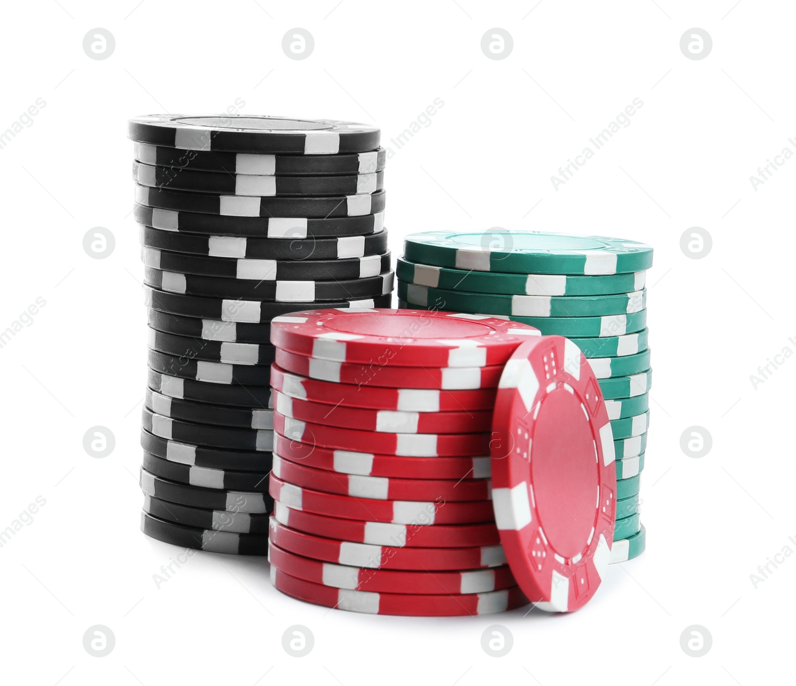 Photo of Plastic casino chips stacked on white background. Poker game