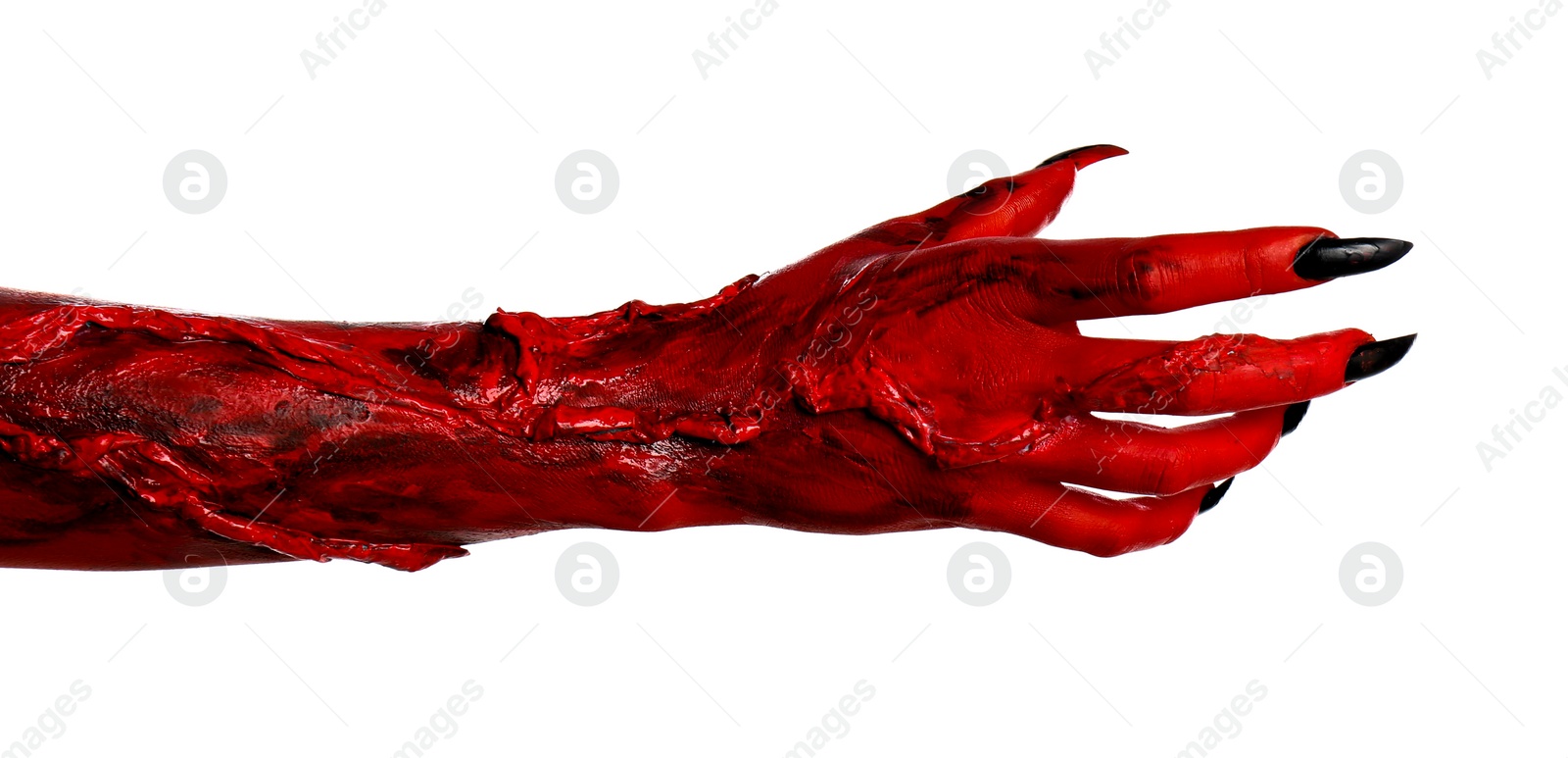 Photo of Scary monster on white background, closeup of hand. Halloween character