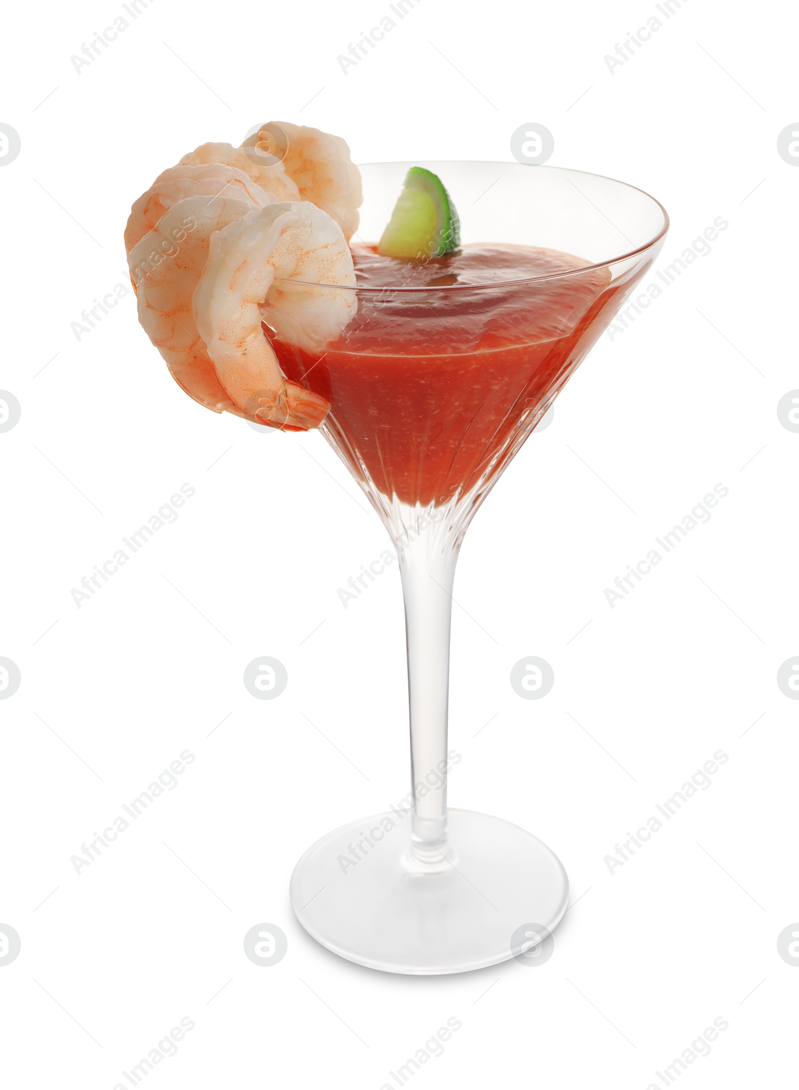 Photo of Tasty shrimp cocktail with sauce and lime in glass isolated on white