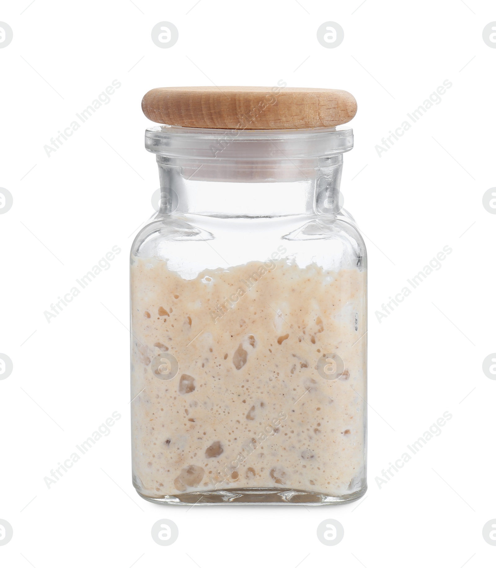 Photo of Fresh leaven in glass jar isolated on white