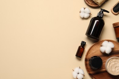 Bath accessories. Flat lay composition with personal care products on beige background, space for text