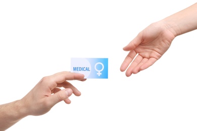 Photo of Man giving medical business card to girl isolated on white, closeup. Women's health service