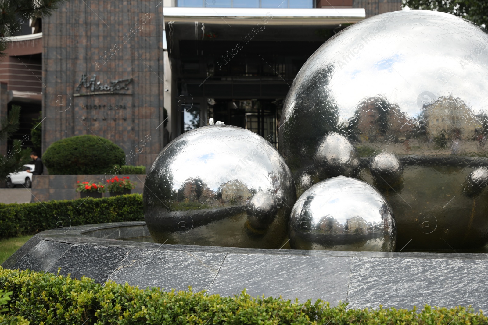 Photo of Truskavets, Ukraine - July 22, 2023: Beautiful fountain on city street, space for text